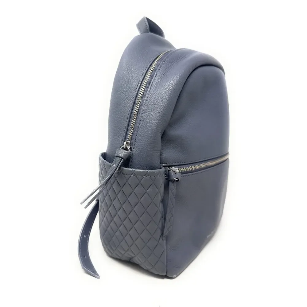 Vera Bradley Black Leather Mini Backpack. Micro Quilt Pockets on the side.